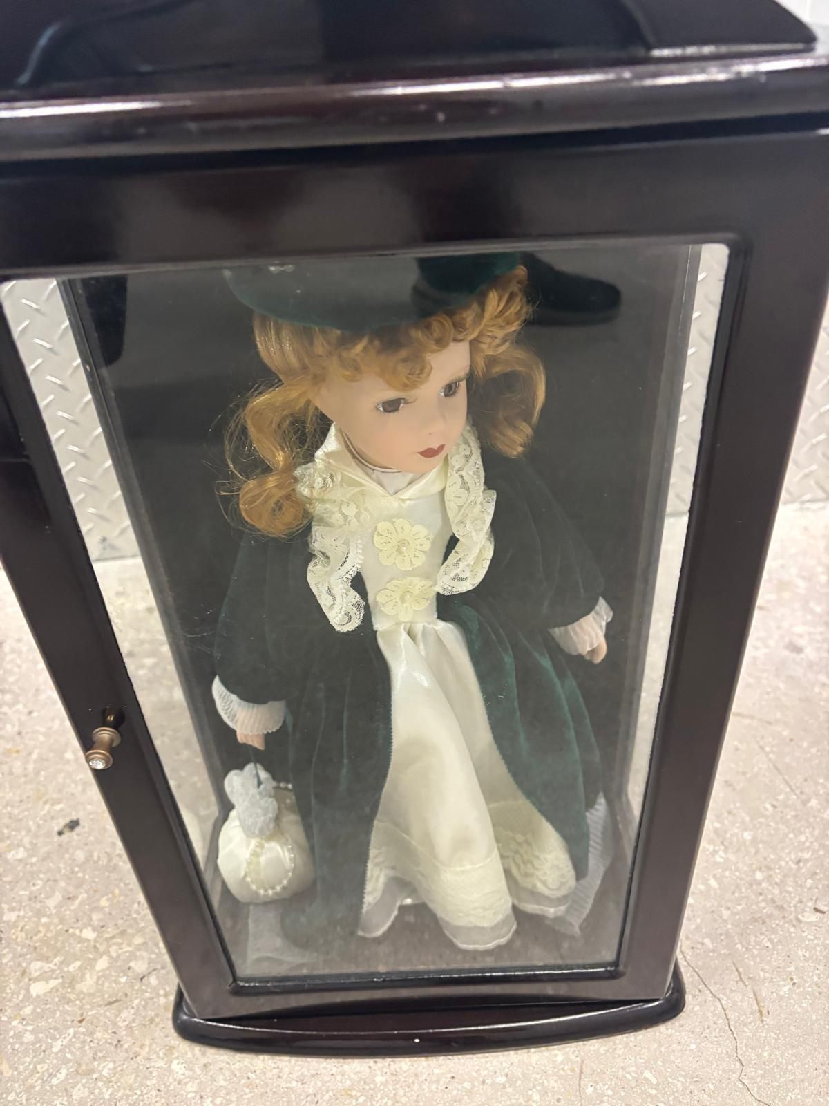 Ashley Belle Collection Camellia Garden genuine, porcelain doll. New in the box. 19” high , 12” wide ,7” depth $40