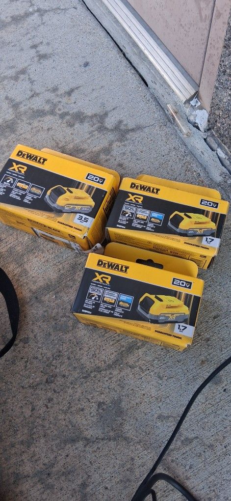 2 Dewalt 'Powerstack' 1.7ah Battery Packs And 1-3.5ah Dewalt 'Powerstack' Battery Pack.