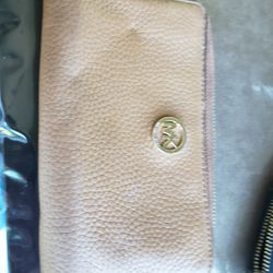 Used MK brown leather wallet. You can restore with leather conditioner 