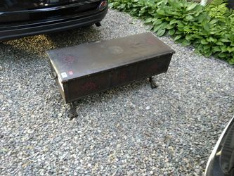 Antique cedar chest with iron base and leather top