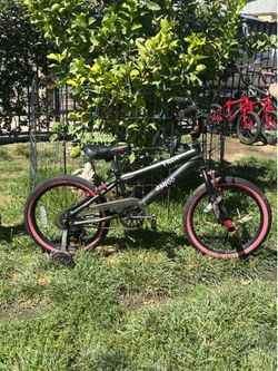 18 INCH KENT BIKE..WITH PEGS AND TRAINING WHEELS