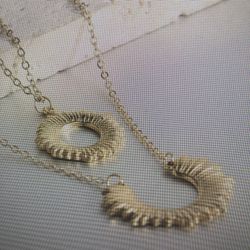 Sun and moon pendant necklace