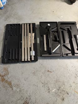 Carpet power stretcher like new with poles and cases