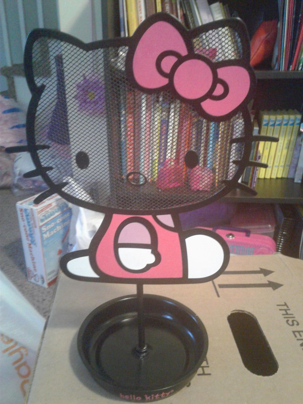 Hello Kitty jewelry holder, collectible tin & books.