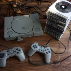PlayStation w/ CDs