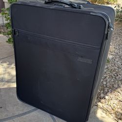 Briggs and Riley checked suitcase medium