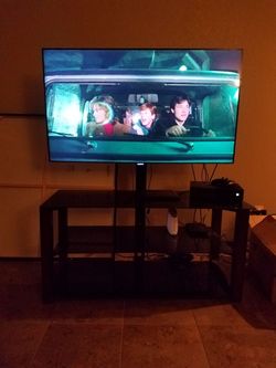 Tv stand. Wood sidings with glass shelves