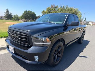 2014 Ram 1500 Express is a quad cab pickup truck