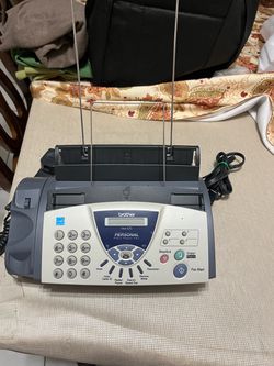 The printer is working and also functions as a fax machine; it is not wireless