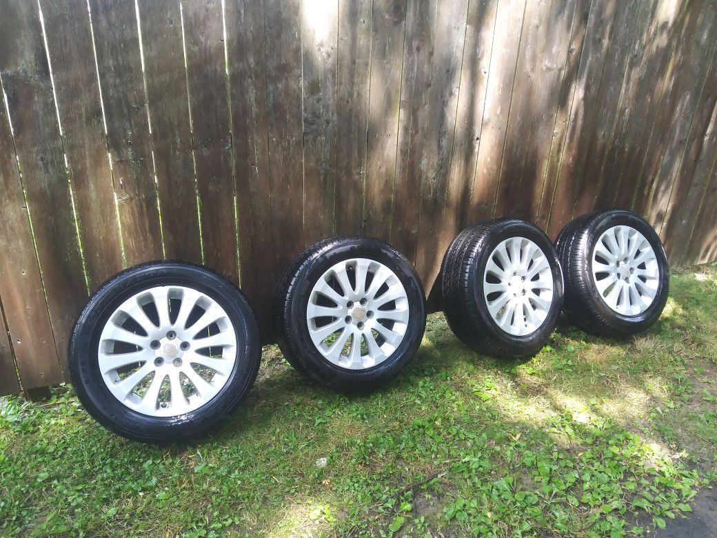 5 x 100 Subaru rims with Slightly Used Tires TPMS sensors inside are good