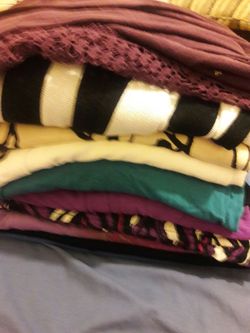 I have 8 used 2x blouses and 1 long sleeve cadigan for sale all 2x sizes