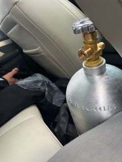 Grey 10 pound nozz tank