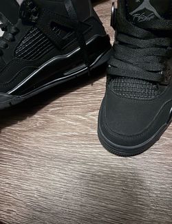 Jordan 4s black cats