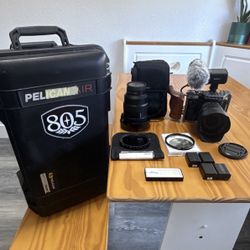 Sony Alpha a7S Mirrorless Camera Body Black w/ Cage & XLR Adapter and Lenses