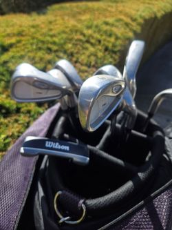 Taylormade Golf Clubs irons with Wilson Putter and bag