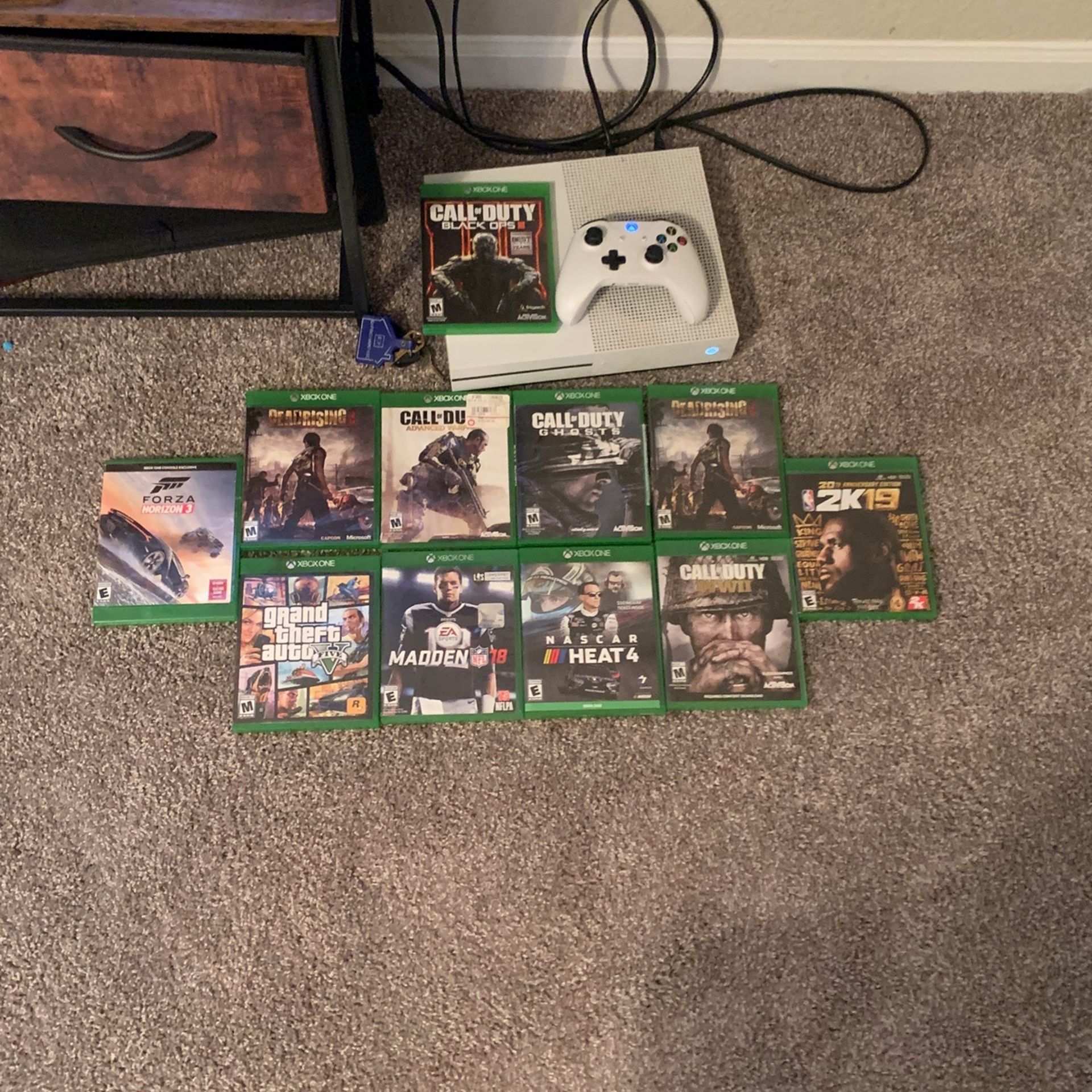 Xbox One Console with 11 games and a controller