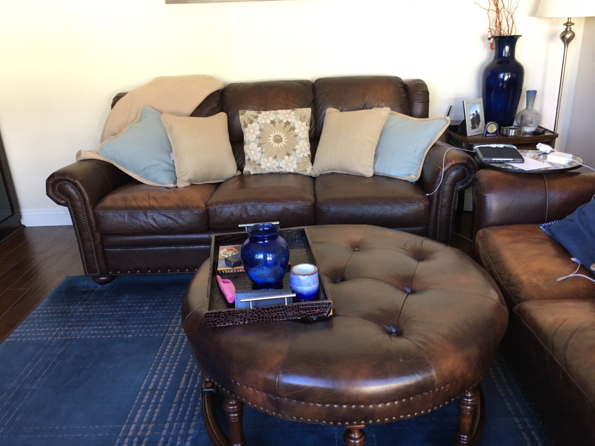 2 leather sofas + ottoman