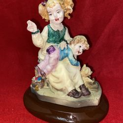 7 Inch x 5 Inch Painted Alabaster Boy & Girl Figurine Imported From Greece