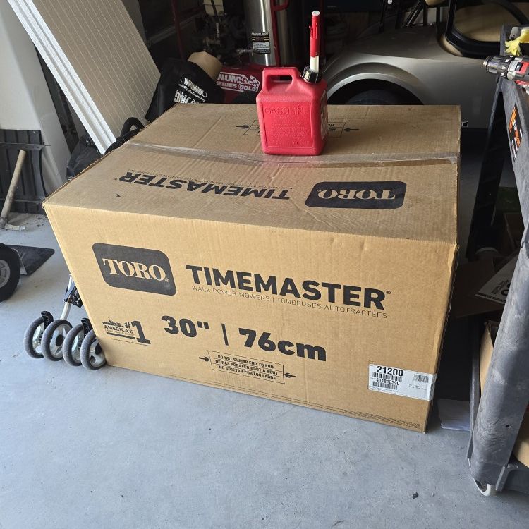 TORO  30 Inch Walk Behind Mower.  Box was never opened . Today's price is at  NFM $1,730 Incl tax.