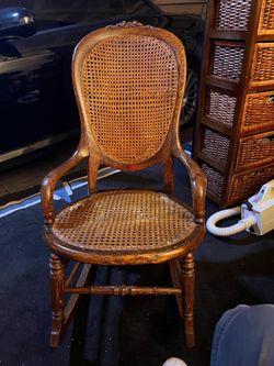 Antique caned oak rocker