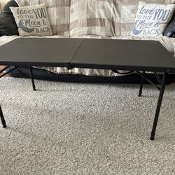 4 ft. Fold-in-half Adjustable Folding Table, Black