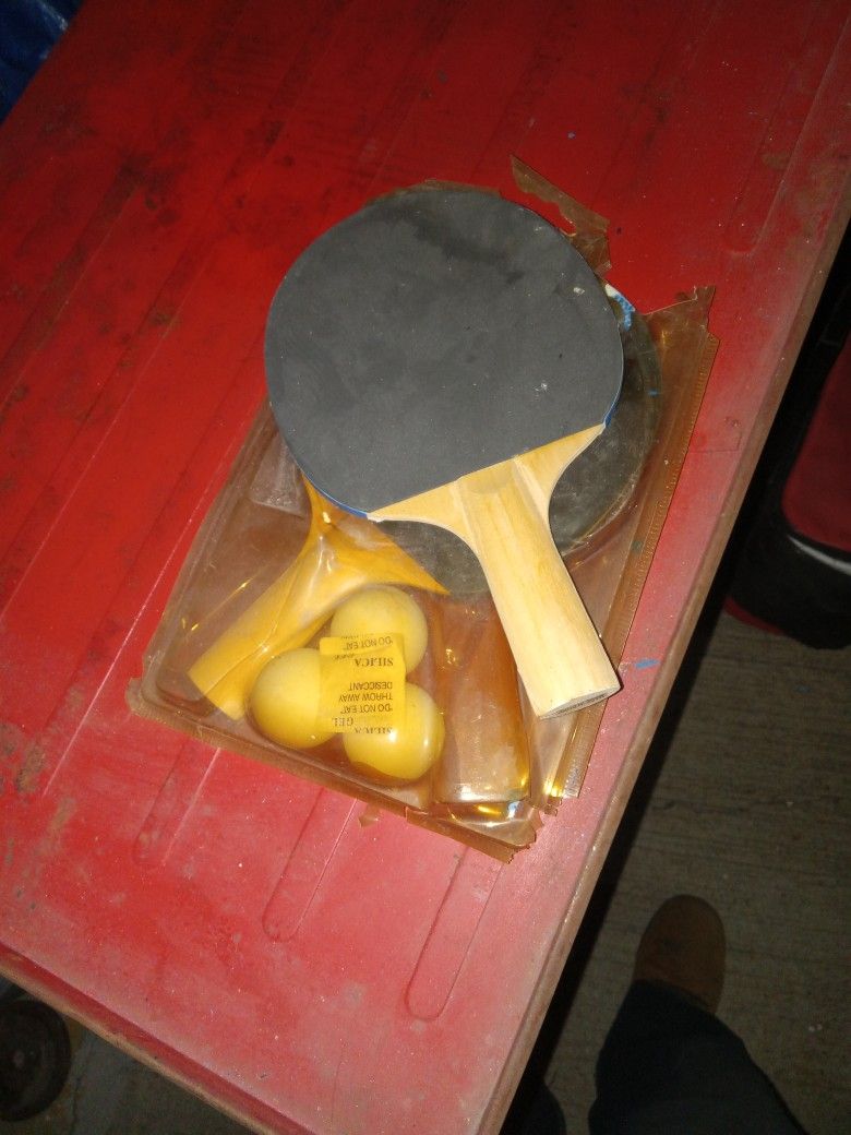 Ping Pong Paddles And Balls $2