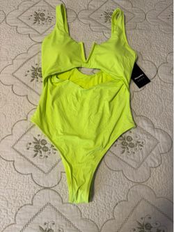 Neon lime cutout one piece swimsuit