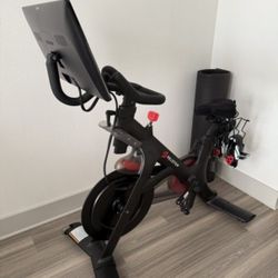 Peloton Bike and Floor Mat 