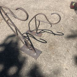 2 cool ornate heavy duty, handmade steel/rebar hangers for plants or something heavy.    One is a little larger than the other. The smaller one is $30