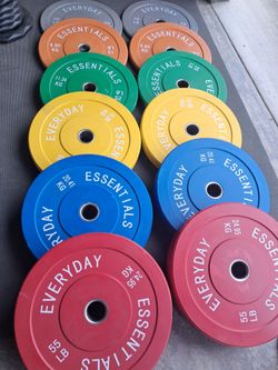 370lb Olympic Size Rubber Coated Weights $370 Firm