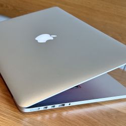 Apple MacBook Pro 15” Retina I7/16GB/500GB SSD $300