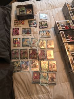 $100 for all cards on sheet and inside tin