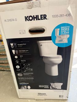 Kohler Gleam 12 in. Rough In 2-Piece 1.28 GFP Single Flush Elongated Chair Height Toilet in White with Soft Close Seat