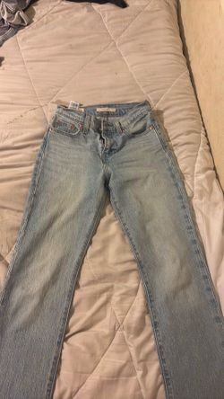 2 pairs of levis size 23