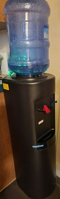 Primo Purified Water Dispenser and 5 gallon jugs