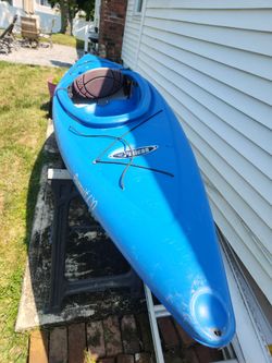 Sit in Pelican kayak with rod holder