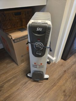 SAI CYAA45-7 1,500-Watt Eco-Fin Oil-Filled Radiator with 7-Fins Portable Heater$25 firm