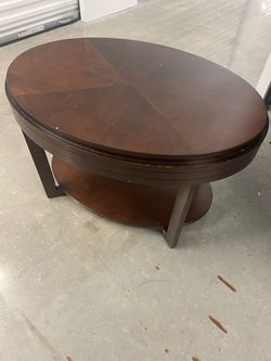 LEICK HOME Chocolate Cherry Solid Wood Oval Apartment Coffee Table