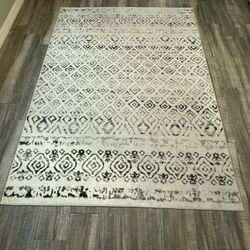 Ivory, Black, And Tan Area Rug