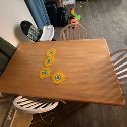 Wooden dining table and chairs