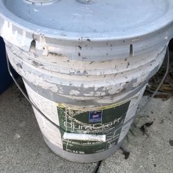 Half Full Bucket Of White Paint 