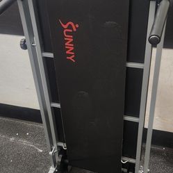 Sunny Health & Fitness manual walking treadmill, likely the model SF-T1407M or a similar compact, non-electric version. 
