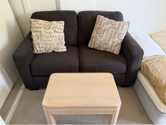 Charcoal gray loveseat