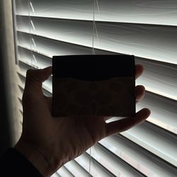brown coach card holder