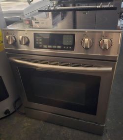 STAINLESS STEEL SLIDE IN GLASSTOP STOVE CONVECTION OVEN.....$ 400