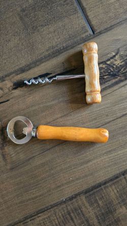 Corkscrew and bottle opener