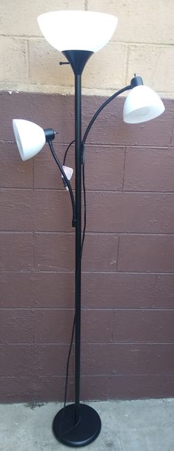 A floor lamp with 3 heads