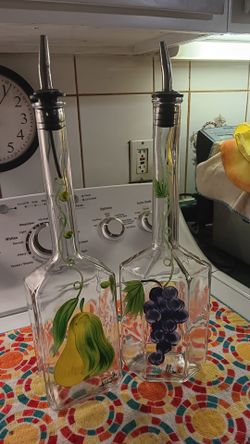 2 new oil bottles 14" both 15