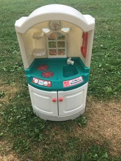 Step 2 kitchenette loaded with food and dishes