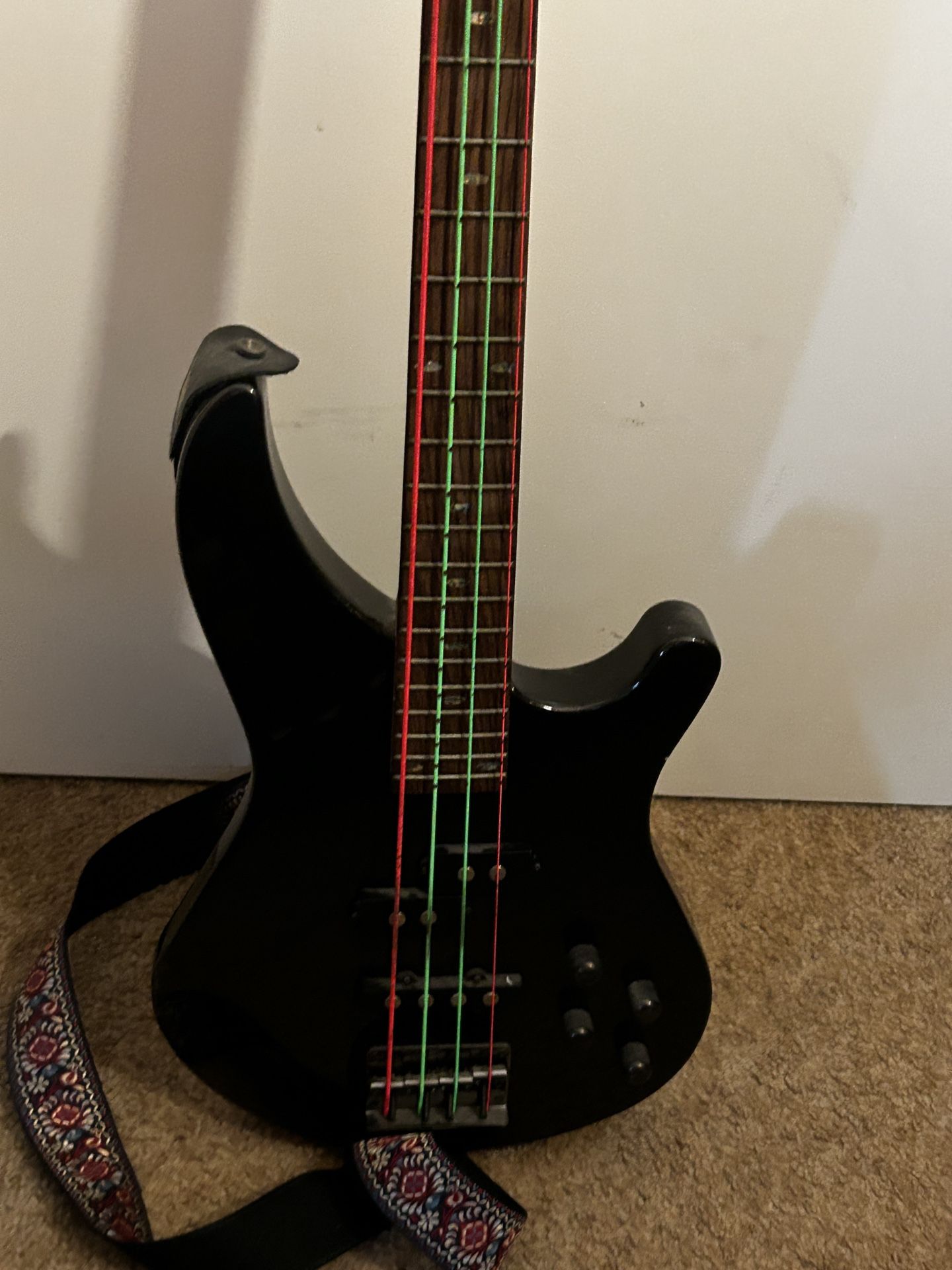 Mitchell black 4 string electric bass